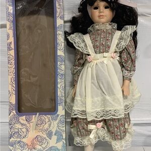 Classic Porcelain Doll with Floral Dress